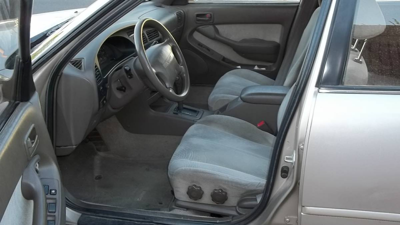 Illustration for article titled At $5,625, Is This 1995 Toyota Camry Wagon a 7-Seat Superstar?